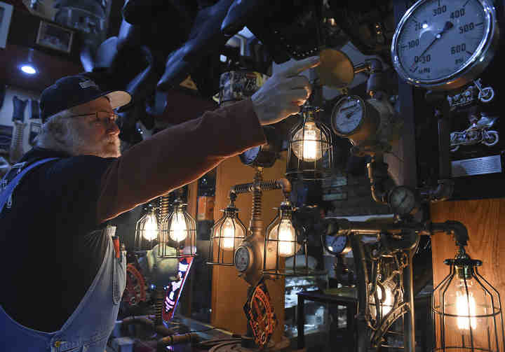 Bear's Vintage Metalworks is a specialty parts store in Ravenna with an expanded Motorcycle and Memorabilia Museum. Bear displays the Steampunk Lamps, Vintage Industrial Art, he builds.     (Lisa Scalfaro / Record-Courier)